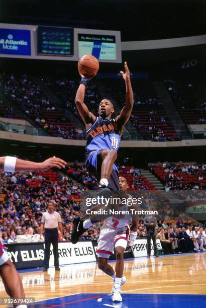 Terrell Brandon of the Cleveland Cavaliers shoots during a game played on February 18, 1995 at Continetal Airlines Arena in East Rutherford, New...