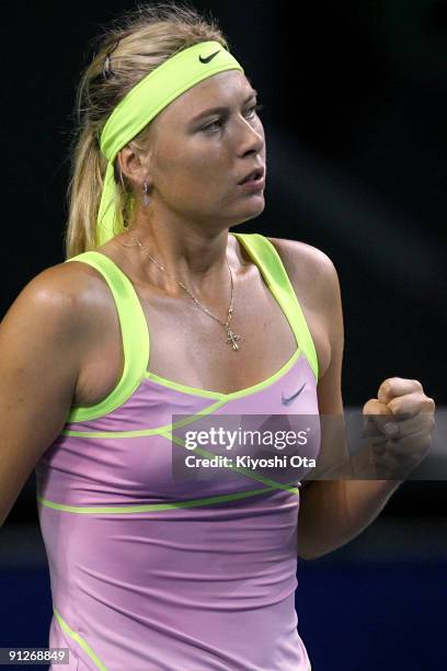 Maria Sharapova of Russia reacts in her match against Alisa Kleybanova of Russia on day four of the Toray Pan Pacific Open Tennis tournament at...
