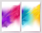 Realistic colorful paint powder explosions on white background.