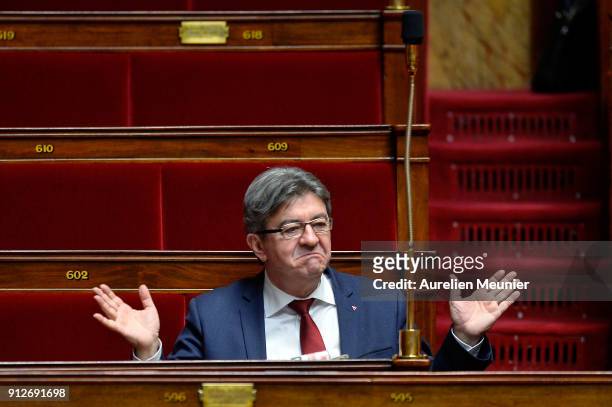 Leader of 'La France Insoumise' Jean Luc Melenchon reacts as Ministers answer deputies questions during the weekly session of questions to the...