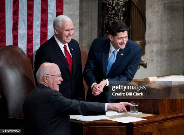 From left, Sen. Patrick Leahy, D-Vt., Vice President Mike Pence and Speaker of the House Paul Ryan, R-Wisc., talk before the start of President...