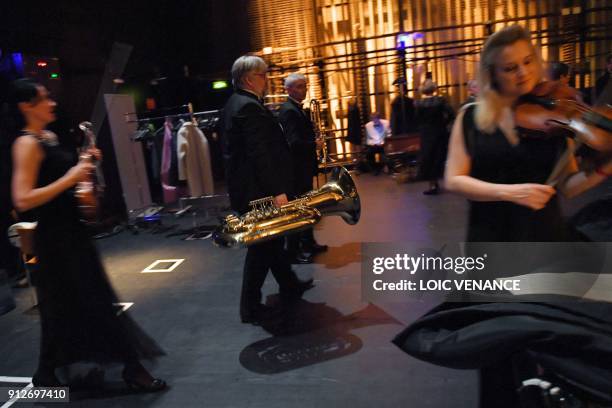 Musicians of the Ural Philharmonic Orchestra practise backstage prior to perform on stage during the first day of "La Folle Journee de Nantes"...