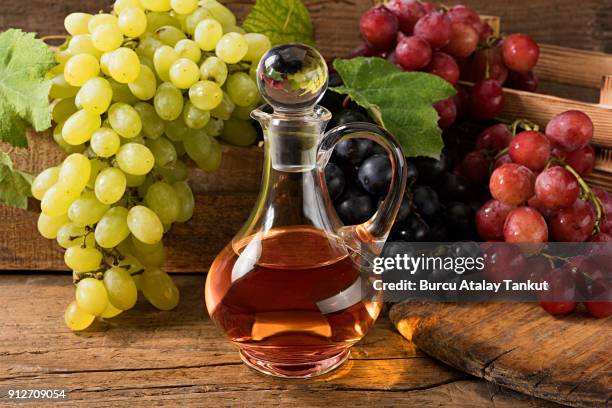 grape vinegar - vinegar stockfoto's en -beelden