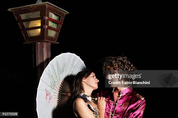 Oriental Costumes Photos and Premium High Res Pictures - Getty Images