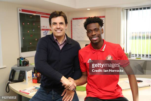 Ovie Ejaria shakes hands with manager Chris Coleman after being unveiled as a Sunderland player at The Academy of Light on January 31, 2018 in...