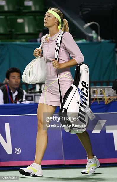 Maria Sharapova of Russia arrives at the centre court to play her match against Alisa Kleybanova of Russia during day four of the Toray Pan Pacific...