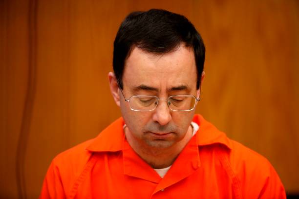 Former Michigan State University and USA Gymnastics doctor Larry Nassar sits during the sentencing phase in Eaton, County Circuit Court on January...