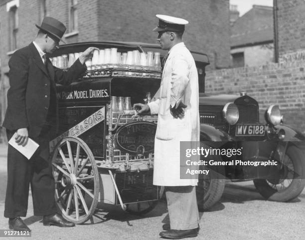 Milkman having his float inspected, circa 1935.