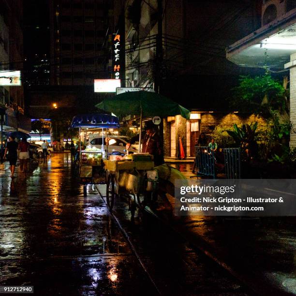 bangkok street food in the rain at night - relfection stock pictures, royalty-free photos & images