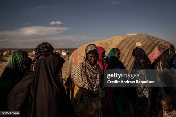 Women at an IDP camp outside of Ainabo. In the last 3 months, 447 pastoralist families have moved to the camp due to drought conditions. Somalia is...