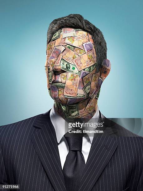 head of bank notes - greed stock pictures, royalty-free photos & images