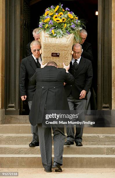 Pall bearers carry Keith Floyd's wicker coffin from Ashton Court Mansion after his funeral on September 30, 2009 in Bristol, England. The TV chef...