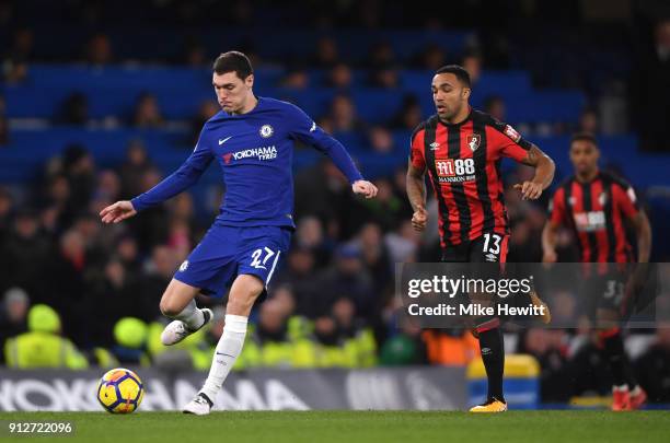 Andreas Christensen of Chelsea passes the ball under pressure from Callum Wilson of AFC Bournemouth during the Premier League match between Chelsea...