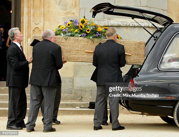 Pall bearers carry Keith Floyd's wicker coffin from Ashton Court Mansion after his funeral on September 30, 2009 in Bristol, England. The TV chef...