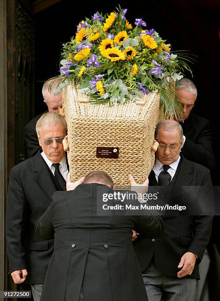 Pall bearers carry Keith Floyd's wicker coffin from Ashton Court Mansion after his funeral on September 30, 2009 in Bristol, England. The TV chef...