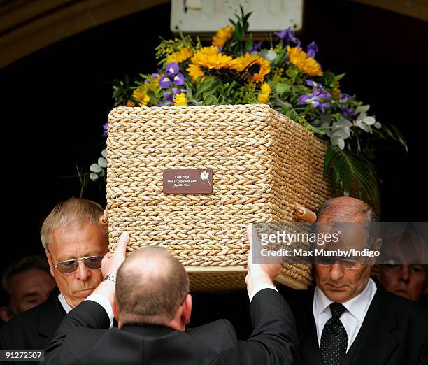 Pall bearers carry Keith Floyd's wicker coffin from Ashton Court Mansion after his funeral on September 30, 2009 in Bristol, England. The TV chef...