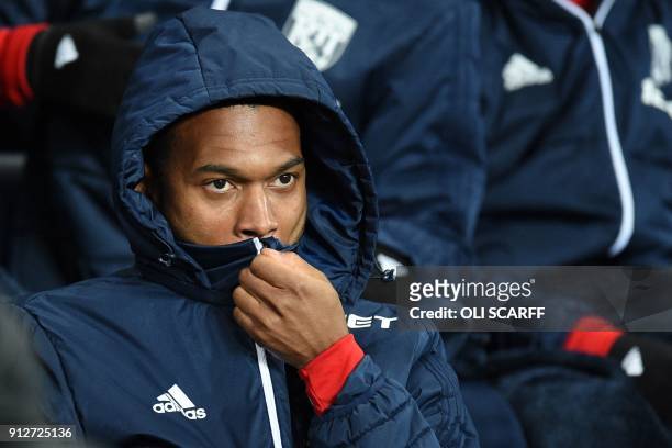 West Bromwich Albion's English striker Daniel Sturridge takes his place on the bench for the English Premier League football match between Manchester...