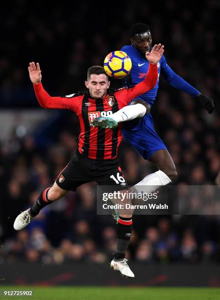 Lewis Cook of AFC Bournemouth battles for possesion with Tiemoue Bakayoko of Chelsea during the Premier League match between Chelsea and AFC...