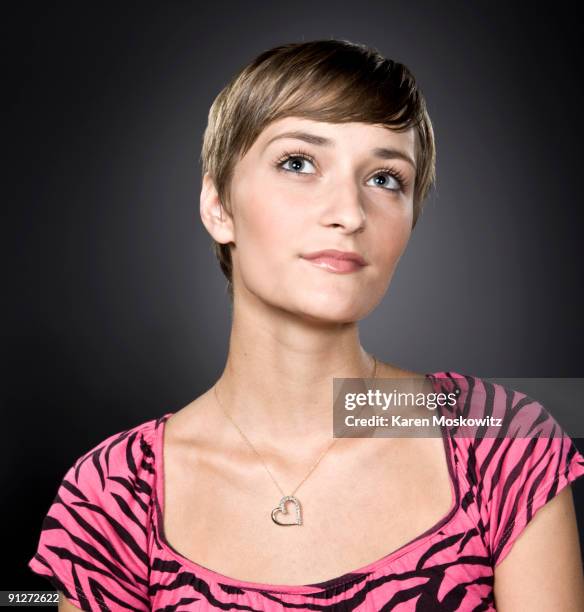 portrait of young woman looking up - pendant stock pictures, royalty-free photos & images