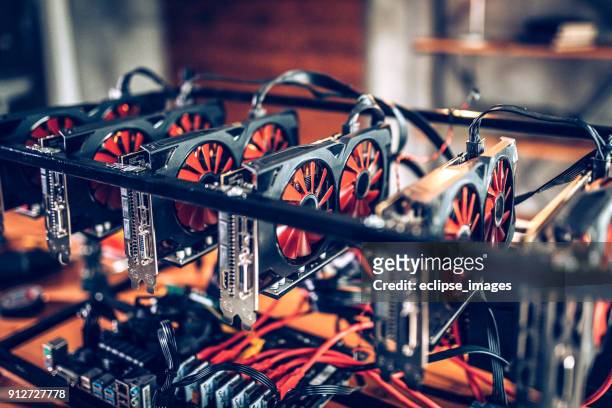 mining rig for cryptocurrency - blockchain mining stock pictures, royalty-free photos & images