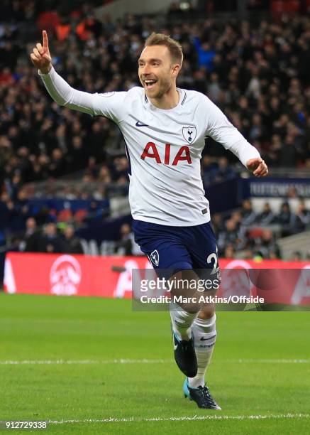 Christian Eriksen of Tottenham Hotspur celebrates scoring the opening goal during the Premier League match between Tottenham Hotspur and Manchester...