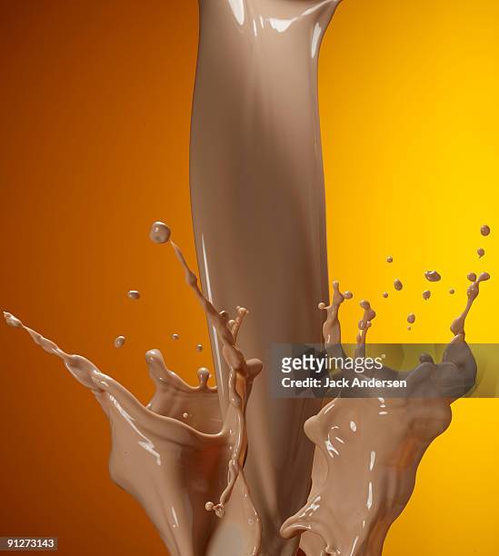 chocolate milk splash - chocolate milk stock pictures, royalty-free photos & images