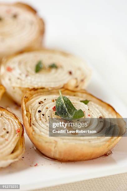 grilled onions with sage and spices - onion stock pictures, royalty-free photos & images