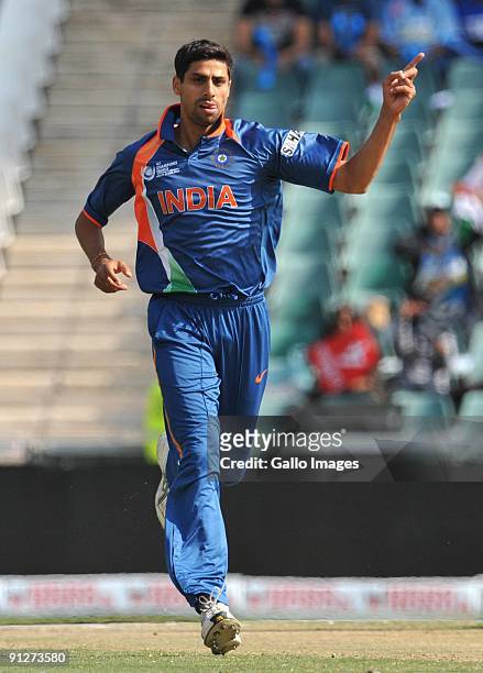 Ashish Nehra of India celebrates the wicket of Kieran Powell of the West Indies for 5 runs during The ICC Champions Trophy Group A Match between...