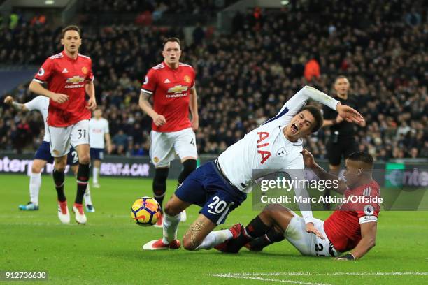 Luis Antonio Valencia of Manchester United brings down Dele Alli of Tottenham Hotspur in the penalty area during the Premier League match between...