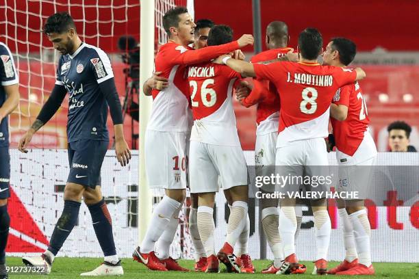 Monaco's Colombian forward Radamel Falcao celebrates with teammates after scoring a goal during the French League Cup semi-final football match...