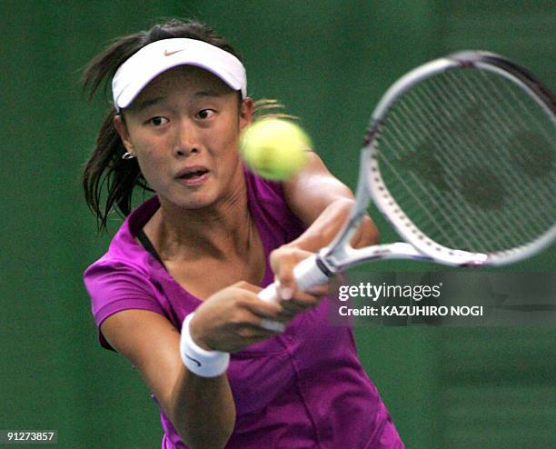 Chang Kai-chen of Taiwan plays a return to Iveta Benesova of the Czech Republic during their women's singles third round match in the Pan Pacific...