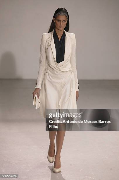 Model walks the runway during the Tim Van Steenbergen Pret a Porter show as part of the Paris Womenswear Fashion Week Spring/Summer 2010 at Espace...