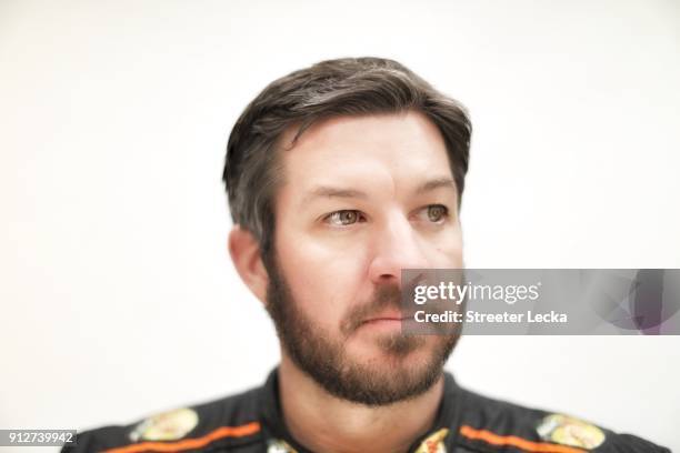 Monster Energy NASCAR Cup Series driver Martin Truex Jr. Poses for a portrait during the Monster Energy NASCAR Cup Series Media Tour at Charlotte...