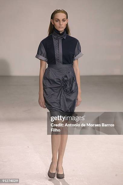 Model walks the runway during the Tim Van Steenbergen Pret a Porter show as part of the Paris Womenswear Fashion Week Spring/Summer 2010 at Espace...