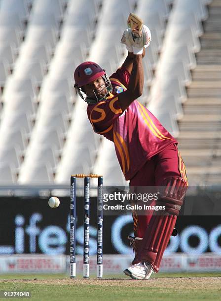 David Bernard of the West Indies hits a straight drive during The ICC Champions Trophy Group A Match between India and West Indies at Wanderers...