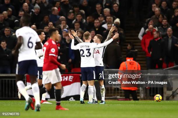Tottenham Hotspur's Christian Eriksen and Kieran Trippier celebrate their sides second goal of the game after Manchester United's Phil Jones scores...