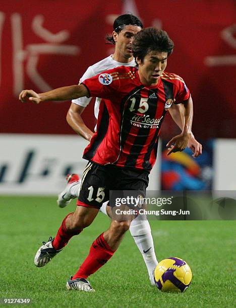 Go Yo-Han of Seoul in action during the AFC Champions League match between FC Seoul and Umm-Salal at Seoul World Cup Stadium on September 30, 2009 in...