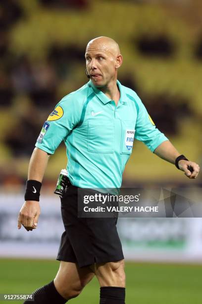 French referee Amaury Delerue reacts during the French League Cup semi-final football match between Monaco and Montpellier at the Louis II stadium in...