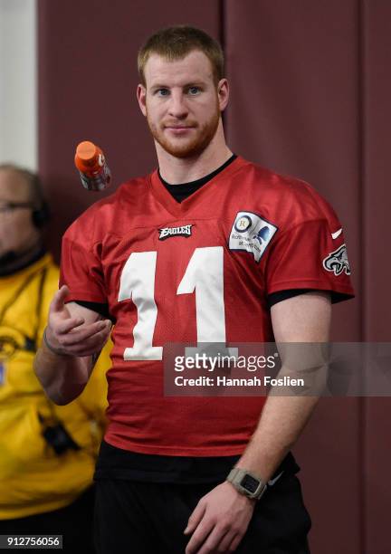 Carson Wentz of the Philadelphia Eagles looks on during Super Bowl LII practice on January 31, 2018 at the University of Minnesota in Minneapolis,...