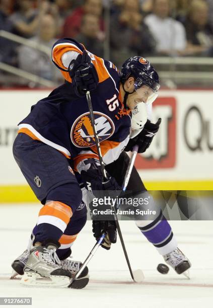 Jeff Tambellini of the New York Islanders faces off during the preseason game against the Los Angeles Kings on September 22, 2009 at the Sprint...