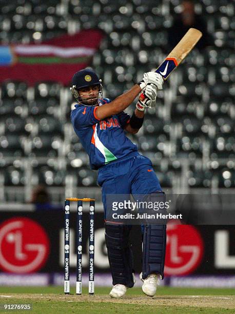 Virat Kohli of India hits out during The ICC Champions Trophy Group A Match between India and West Indies at Wanderers Stadium on September 30, 2009...