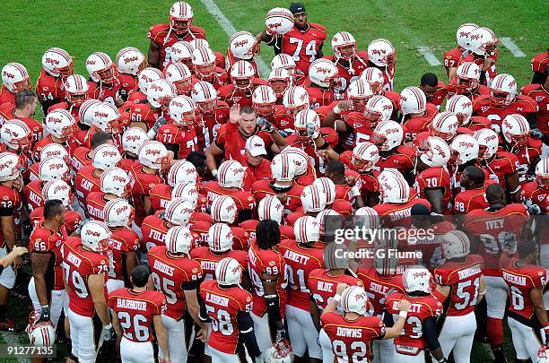 The Maryland Terrapins huddle around head coach Ralph Friedgen before the game against the Rutgers Scarlet Knights at Byrd Stadium on September 26,...