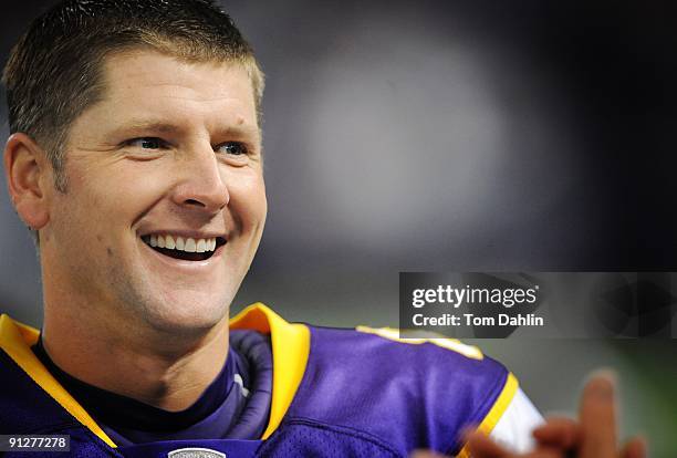 Ryan Longwell of the Minnesota Vikings talks with a teammate prior to an NFL game against the San Francisco 49ers at the Hubert H. Humphrey...