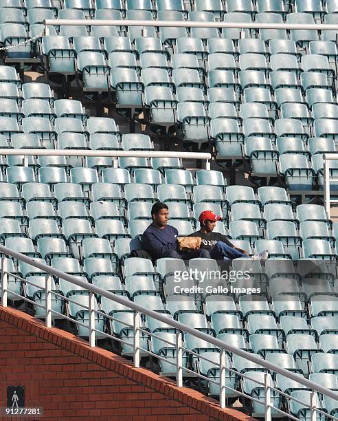 Spectators watch The ICC Champions Trophy Group A Match between India and West Indies at Wanderers Stadium on September 30, 2009 in Johannesburg,...
