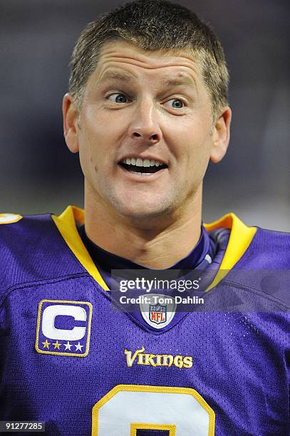 Ryan Longwell of the Minnesota Vikings talks with a teammate prior to an NFL game against the San Francisco 49ers at the Hubert H. Humphrey...