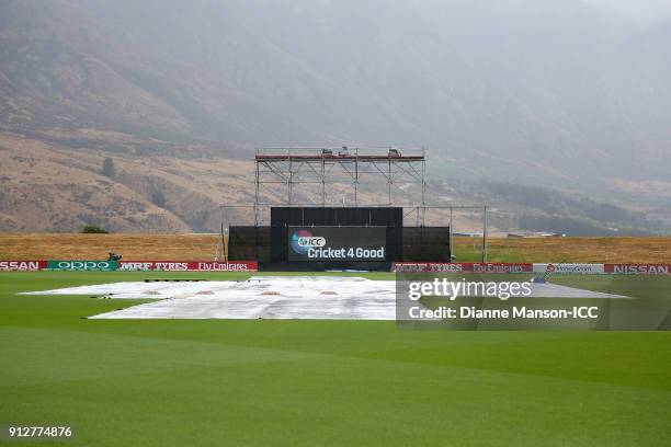 Wet weather conditions delay play during the ICC U19 Cricket World Cup match between Afghanistan and Pakistan at Joh Davies Oval on February 1, 2018...