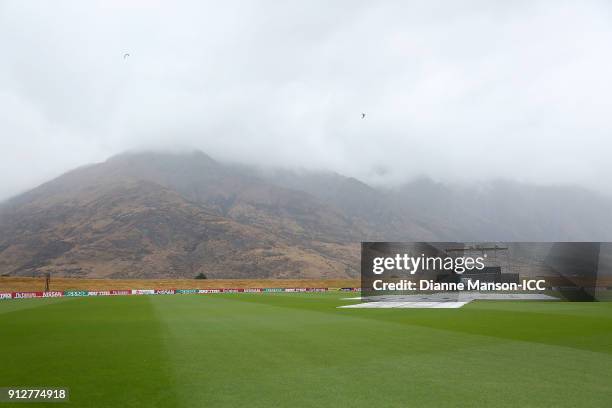 Wet weather conditions delay play during the ICC U19 Cricket World Cup match between Afghanistan and Pakistan at Joh Davies Oval on February 1, 2018...