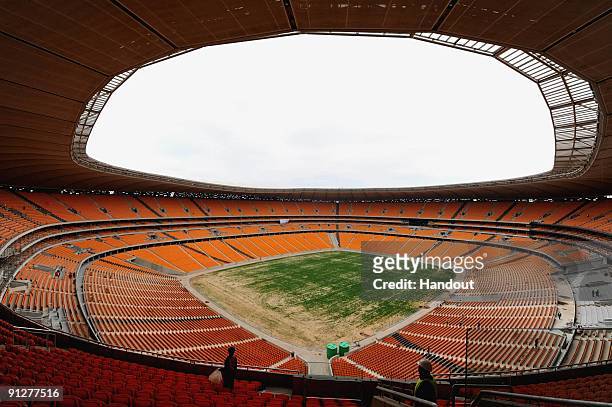 In this handout image provided by the 2010 FIFA World Cup Organising Committee South Africa, a general view of Soccer City Stadium on September 30,...
