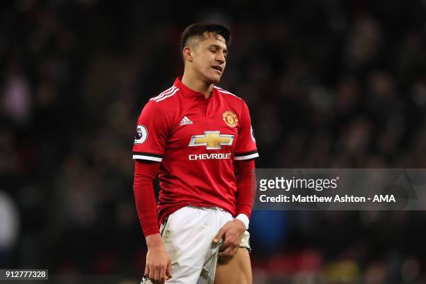 Alexis Sanchez of Manchester United reacts during the Premier League match between Tottenham Hotspur and Manchester United at Wembley Stadium on...