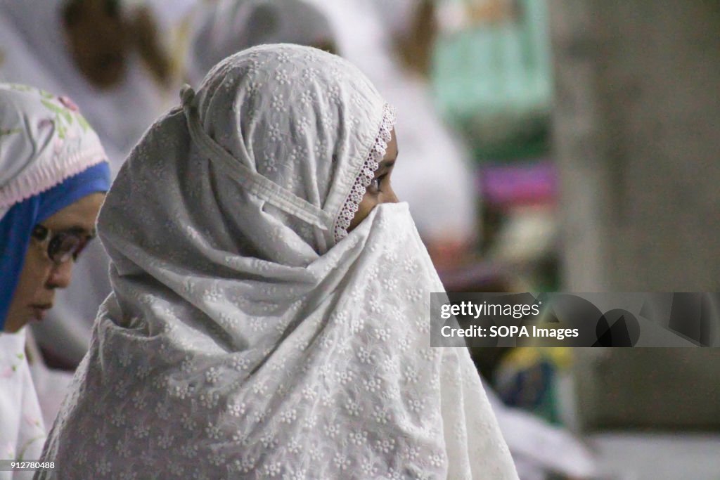 Muslims seen praying during the moon eclipse phenomenon in...